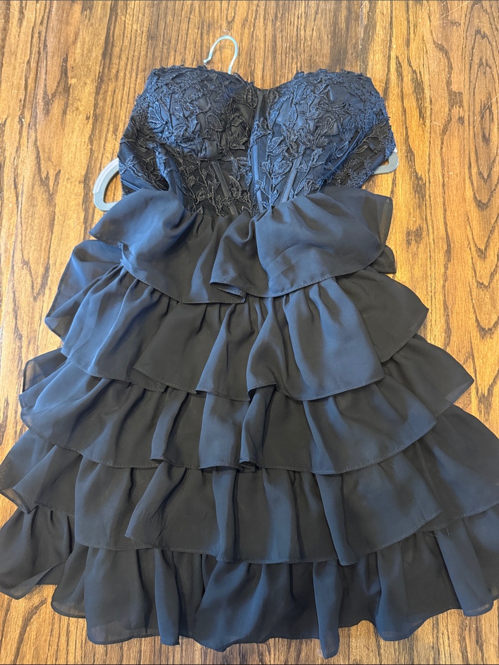 Strapless lace up Black Mini Dress with Ruffled Skirt. Size 0